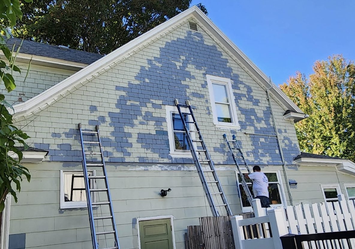 Weathered, peeling exterior siding before Noe's Painting refresh