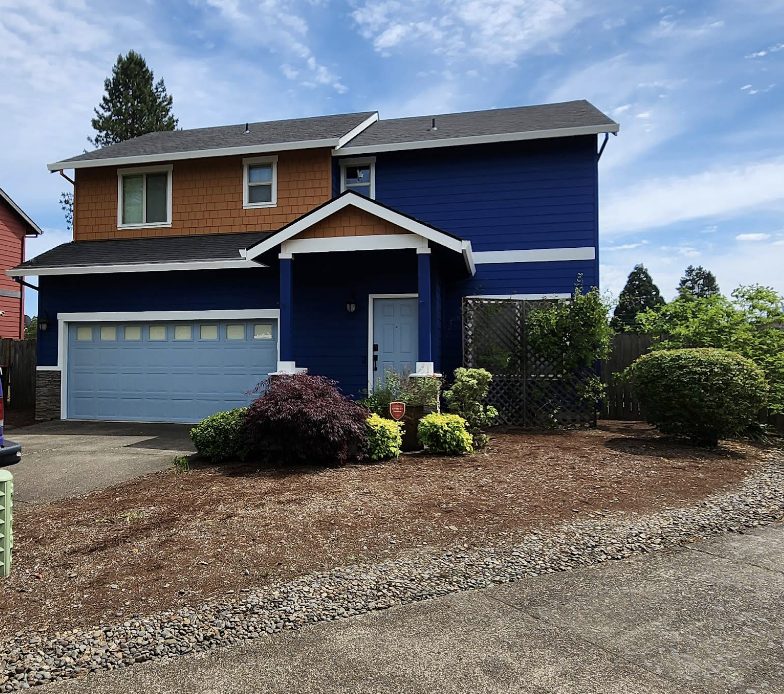 Two-story exterior painting project by Noe's Painting