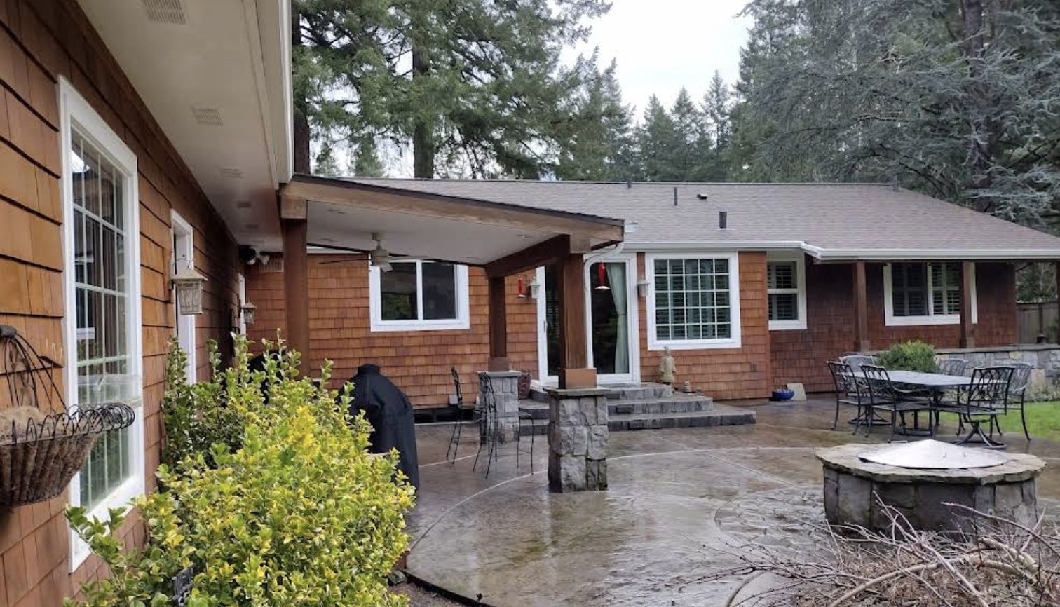 Cedar shingle exterior and covered patio painted by Noe's Painting